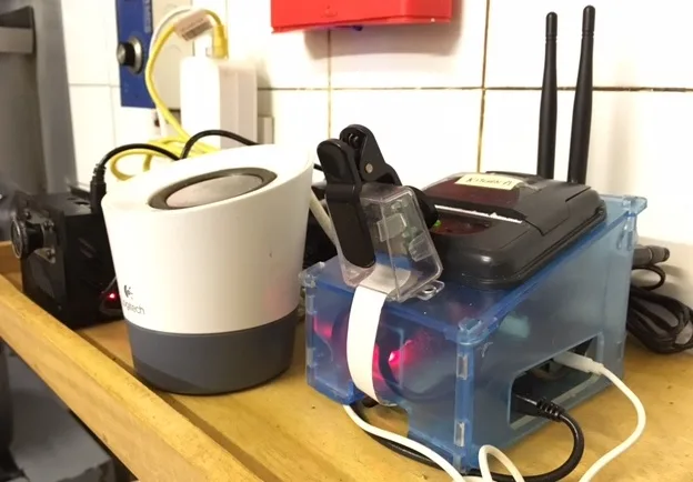A Pipsta thermal printer on a Raspberry Pi printing order tickets in the restaurant kitchen
